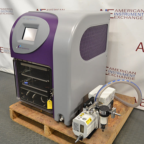 Right three-quarter angle product view of an SP VirTis AdVantage Pro laboratory freeze dryer, focusing on the right side ventilation grille, purple front panel, digital touchscreen, and attached vacuum pump system on a wooden pallet