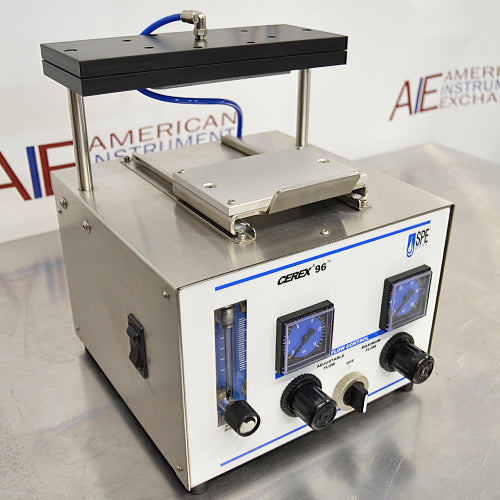 Three-quarter angle product view of an SPE ware CEREX 96 processor, highlighting the side power switch, front control panel, flow meter, gauges, and upper mounting rack on a stainless steel counter