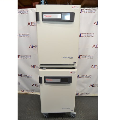 Front perspective view of a stacked pair of Thermo Heracell VIOS 160i CO₂ incubators on a rolling stand featuring digital touch display panels