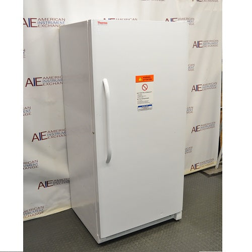 Left angled perspective view of white Thermo Scientific 20LREETSA laboratory refrigerator with closed door showing front warning label