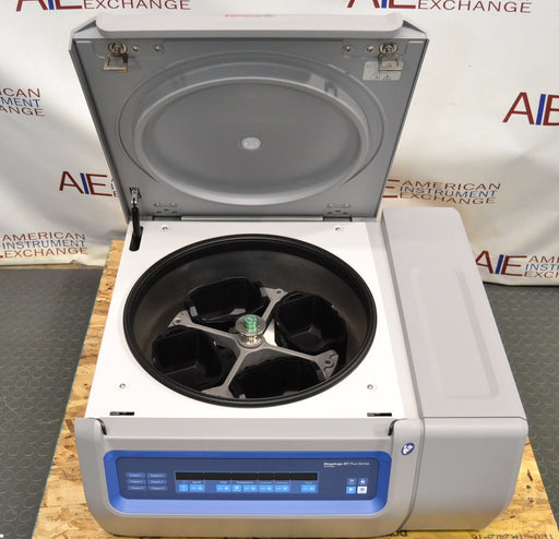 Top-down view of a Thermo Scientific Megafuge ST4R Plus MD refrigerated centrifuge with its lid open, revealing the internal rotor with four buckets, front digital control panel, and gray-and-white housing unit