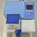 Elevated top product view of a Thermo Scientific Multidrop Combi nL Type 838 reagent dispenser, showcasing its blue and white housing, display control panel, and dispensing head