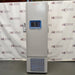 Studio front product view of a Thermo Scientific RLE30086D ultralow laboratory freezer against a branded backdrop, highlighting its tall white insulated cabinet, central door-mounted digital touchscreen interface with a blue bezel, handle mechanism on the left, and lower vented compressor grille