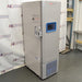 Three-quarter angle view of Thermo Scientific RLE30086D ultralow laboratory freezer, highlighting its white insulated body, locking handle mechanism, digital touchscreen, and lower vented compressor grille
