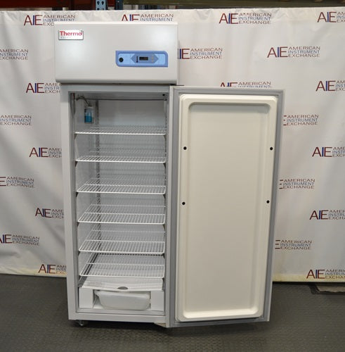 Thermo Scientific TSFMS2305A flammable material storage refrigerator with open door revealing interior wire shelves and top digital control console