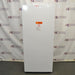 Front perspective view of white Thermo Scientific TSV20FPSA11 convertible refrigerator freezer with closed door showing front warning label