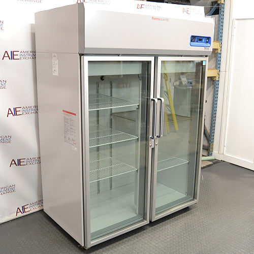 Thermo Scientific TSX Series Refrigerator TSX5005GA double-door laboratory refrigerator ka left angle view, jisme left side ki exterior body, glass doors, aur top digital control panel saaf dikhai de raha hai.   