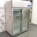 Thermo Scientific TSX Series Refrigerator TSX5005GA double-door laboratory refrigerator ka left angle view, jisme left side ki exterior body, glass doors, aur top digital control panel saaf dikhai de raha hai.   