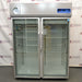 Front product view of a Thermo Scientific TSX5005CA high-performance laboratory refrigerator, featuring dual glass doors, wire shelving inside, a top-mounted control panel, and an integrated chart recorder