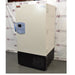 Angled perspective view of a Thermo Scientific TSX600D ultra-low temperature freezer showcasing its front door, blue control panel, and heavy-duty side hinge assembly