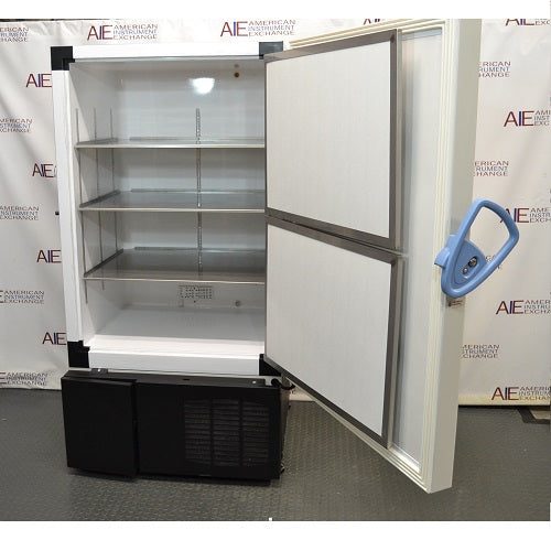 Front view of a Thermo Scientific TSX600D ultra-low temperature freezer with the outer door open and inner compartment doors removed, revealing the empty stainless steel interior shelving