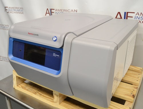 Angled perspective view of a Thermo Sorvall X1R Pro refrigerated centrifuge resting on a wooden pallet highlighting its control interface and refrigeration housing unit