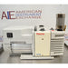 Side profile view of a Thermo Scientific VLP120 deep vacuum oil pump, showcasing its white housing, power switch, central pump unit, and vertical exhaust filter on a stainless steel bench