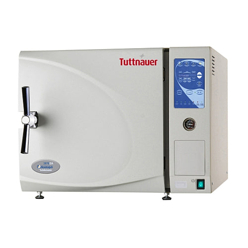 Front angle product view of a Tuttnauer EA Series 3850EA 65L tabletop autoclave, featuring its light grey body housing, front-loading door with a polished metal locking handle, digital control panel, and integrated pressure gauge