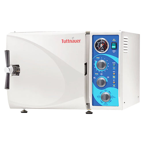 Front angle product view of a Tuttnauer M-Series 3850M 64L manual tabletop autoclave, featuring its light grey body housing, front-loading door with a chrome locking handle, and a right-hand blue control panel with mechanical knobs, pressure gauge, and power switch