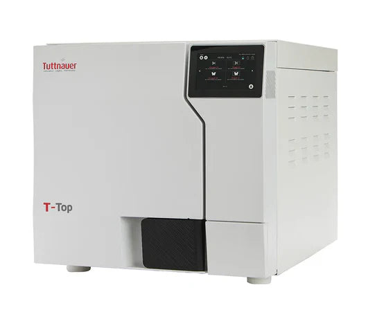 Three-quarter perspective view of a white Tuttnauer T-Top 11S tabletop autoclave featuring a top-right digital touchscreen display and side ventilation slots
