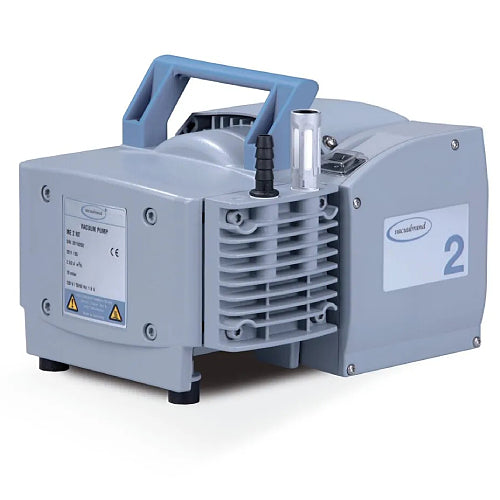 Front three-quarter product view of a Vacuubrand ME 2 NT diaphragm vacuum pump, highlighting its grey housing, top blue carrying handle, specification plate, and vertical port connections