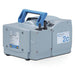 Front three-quarter product view of a Vacuubrand ME 2C NT chemistry diaphragm vacuum pump, featuring its grey housing, top blue carrying handle, specification plate, and barbed port connectors
