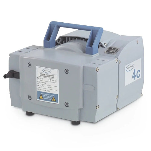 Front three-quarter product view of a Vacuubrand ME 4C NT chemistry diaphragm vacuum pump, featuring its grey housing, top blue carrying handle, specification plate, and inlet port