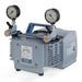 Front three-quarter product view of a Vacuubrand ME 4R NT diaphragm vacuum pump, highlighting its grey housing, top blue carrying handle, specification plate, and dual pressure gauges