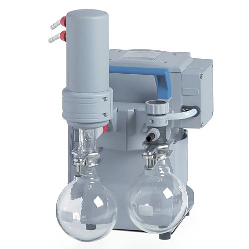 Front three-quarter product view of a Vacuubrand MZ 2C NT +AK+EK chemistry diaphragm vacuum pump, showcasing its grey housing, dual glass collection flasks, and emission condenser setup
