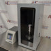 Right angled perspective view of Sonics Vibra-Cell VCX 500 ultrasonic processor control unit next to sound-abating enclosure containing converter and probe setup
