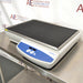 Right three-quarter angle product view of a VWR Model 5000 advanced orbital shaker, showcasing the non-slip platform mat, low-profile housing on a stainless steel table, and front-mounted digital control panel