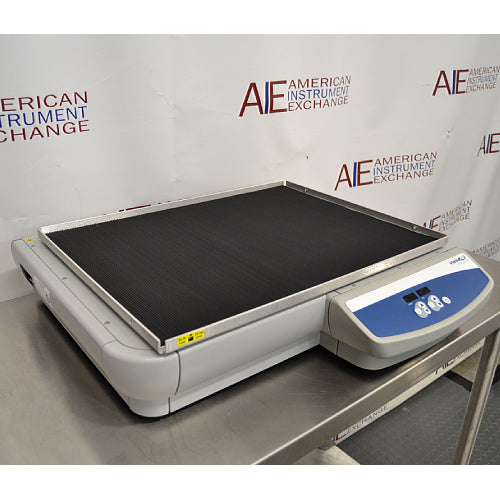 Three-quarter angle product view of a VWR Model 5000 advanced orbital shaker, emphasizing its low-profile housing, textured non-slip platform mat, and extended digital control panel