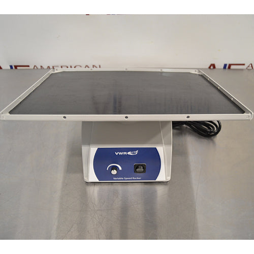 Front product view of a VWR variable speed 2D rocker model BR2000-GM, showcasing its large flat rocking platform with a black non-slip rubber mat, supporting base stand, and front blue control panel featuring a speed adjustment dial and power switch