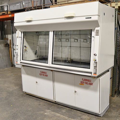 A white Fisher Hamilton 8' Chemical Fume Hood with flammable storage base cabinets, featuring a split vertical-rising sash, a work surface, and various fixtures such as monkey bars and external outlets.