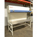 An alternative angled view of a Thermo Heraguard ECO 1.8 laminar flow clean bench, showing its wide stainless steel work surface, open front workspace, side glass panels, and upper control console.