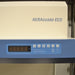 A close-up view of the digital control panel and brand logo on a Thermo Heraguard ECO 1.8 laminar flow clean bench, featuring an LED display screen and operational control buttons.