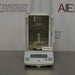 Direct front view of Ohaus Explorer E10640 analytical balance with glass draft shield enclosure