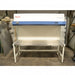 A front-facing view of a Thermo Heraguard ECO 1.8 laminar flow clean bench, showing its wide stainless steel work surface, open front workspace, side glass panels, and upper control console.