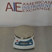 Front view of Ohaus CS 200 compact digital scale on metallic surface