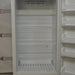 Open interior view of Fisher Scientific Isotemp Value laboratory refrigerator with wire shelves and door bins