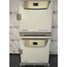 Front product view of a stacked dual Eppendorf New Brunswick S41i CO2 incubator system with integrated shakers, showcasing two identical units mounted on a wheeled base frame in a laboratory setting