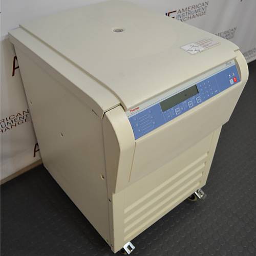 Front angled perspective view of a Thermo Scientific Sorvall Legend XFR floor-standing refrigerated centrifuge on casters, featuring its beige housing, closed lid, louvered lower base, and front control panel