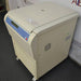 Right angled perspective view of a Thermo Scientific Sorvall Legend XFR floor-standing refrigerated centrifuge on casters, featuring its beige housing, closed lid, side cooling vent, and front control panel